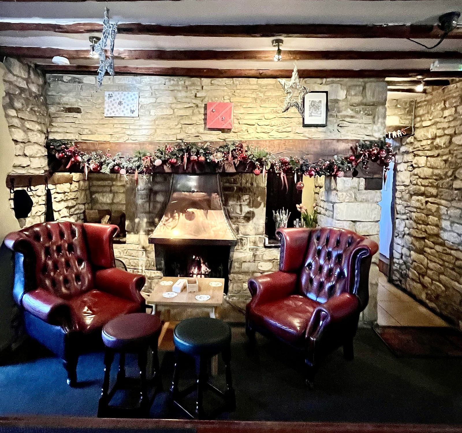 Armchairs by the open fire