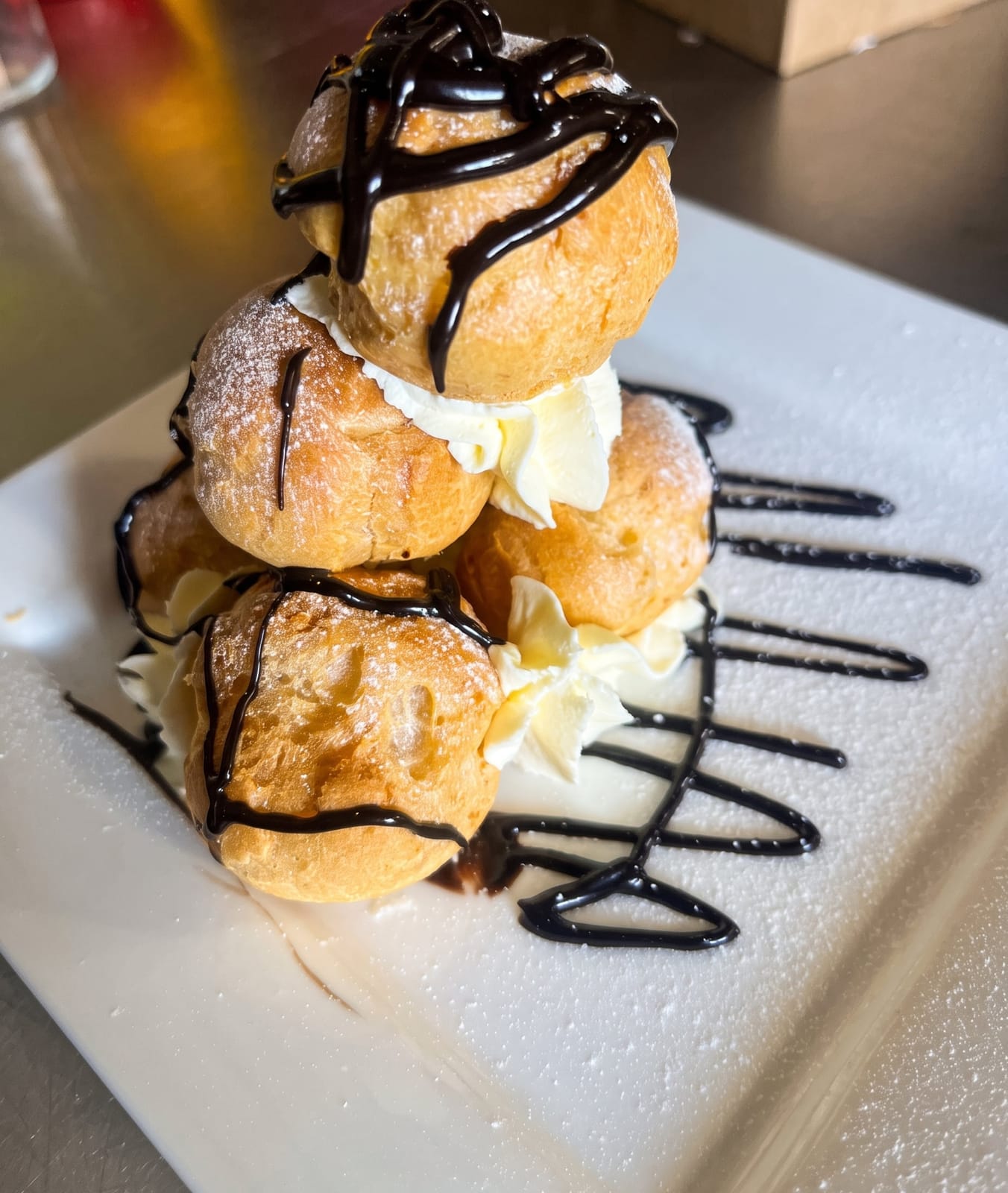 Profiteroles with chocolate sauce